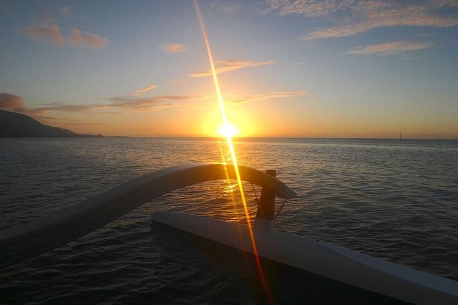 2-hour Private Sunset Cruise - Boarding a traditional Polynesian canoe