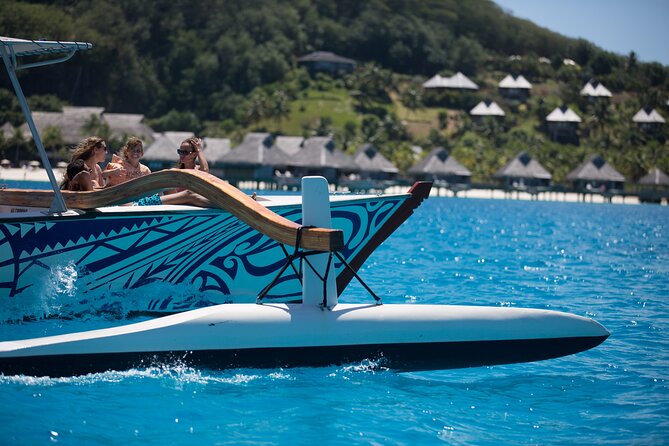 Full Day Lagoon Group Tour in Bora Bora with Lunch - Motu lunch with fish under the table