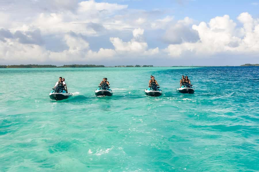 Jet Ski Around Bora Bora - Speed Through Paradise - Swimming in the clear lagoon