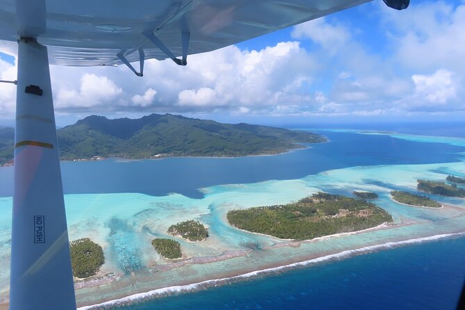 Private flight, in a light plane over the Polynesian motus from Raiatea - A private cabin, not a private group charter