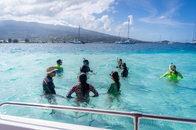 Tahiti Lagoon Snorkeling and Lunch Boat Tour (6 pax max) - Eating poisson cru in the lagoon