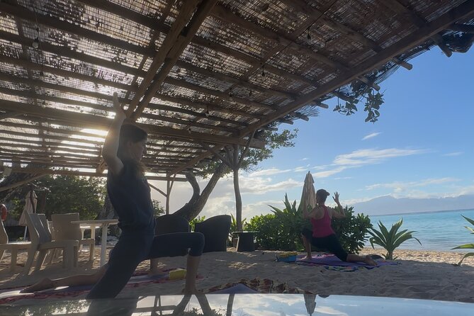 Yoga at sunrise at Sofitel Moorea, overlooking Tahiti - Equipment is covered, but pack water