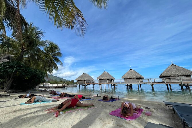 Yoga on the paradise beach of Manava Moorea - The setting is part of the experience